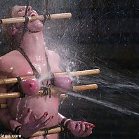 Busty blonde beauty is bound, gagged and tormented with water.