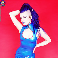 blue haired punk slut in rubber dress and high heels