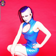 blue haired punk slut in rubber dress and high heels