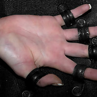 Tight black latex bondage BDSM.