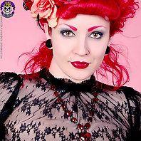 stacked sexy rubber red fetish girl with lace top