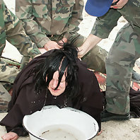 Check out this submissive lady as she gets abducted by soldiers and experiences an outdoor BDSM orgy