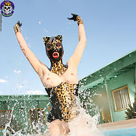 Pervy rubber fetish cat girl gets wet