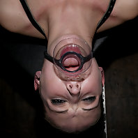 Hailey Young and Ariel locked in severe steel bondage