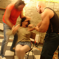 Check out this submissive lady as she gets bound and tortured by two macho guys in this BDSM story l