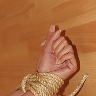 Asian girl bound and cleavegagged