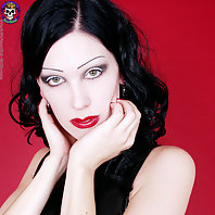 stacked vamp in corset and tight rubber dress