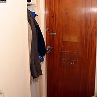 Cecilia is coming home after a hard day at work. She goes to the kitchen and make her self a sandwic